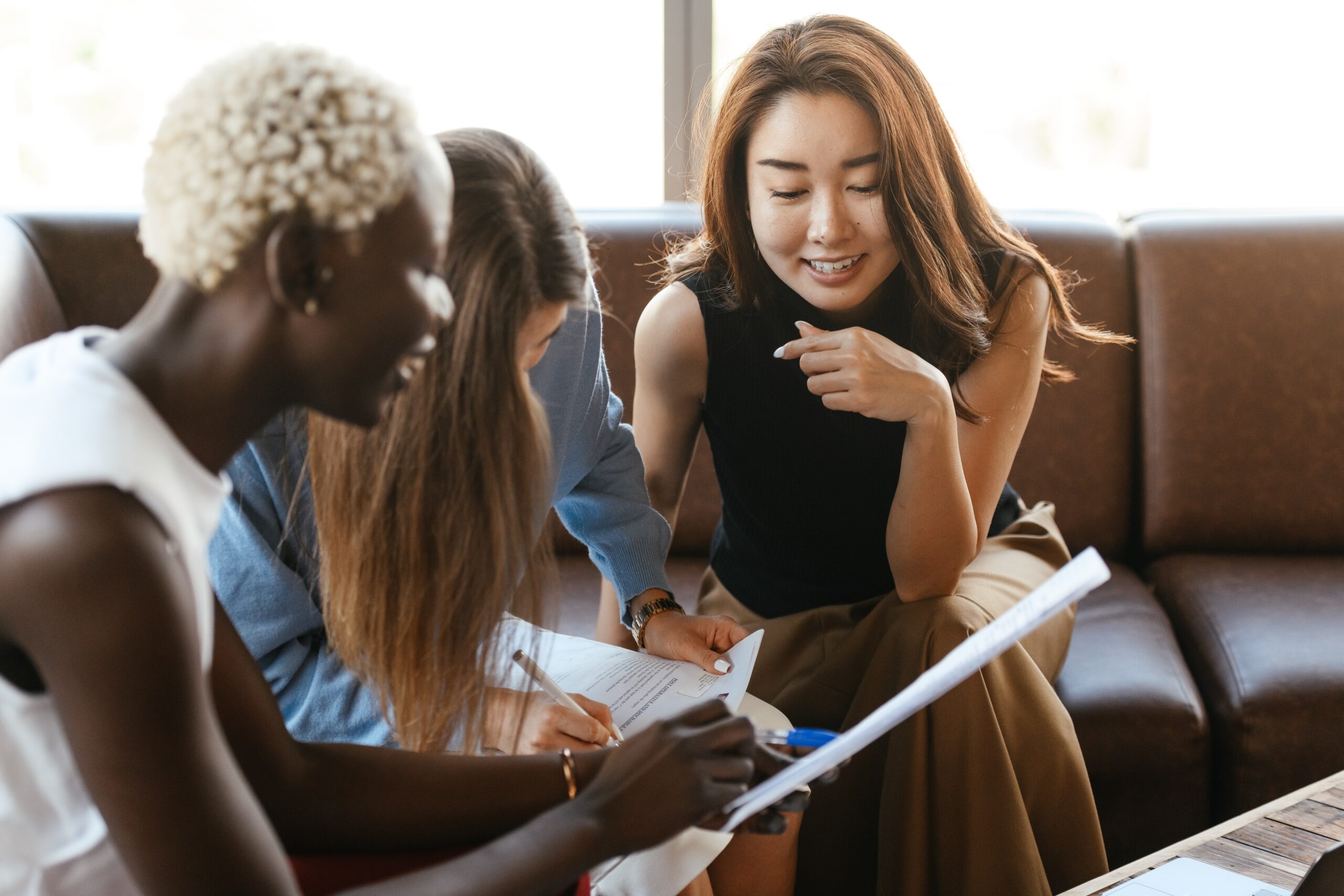 couple reviewing contracts with a lawyer