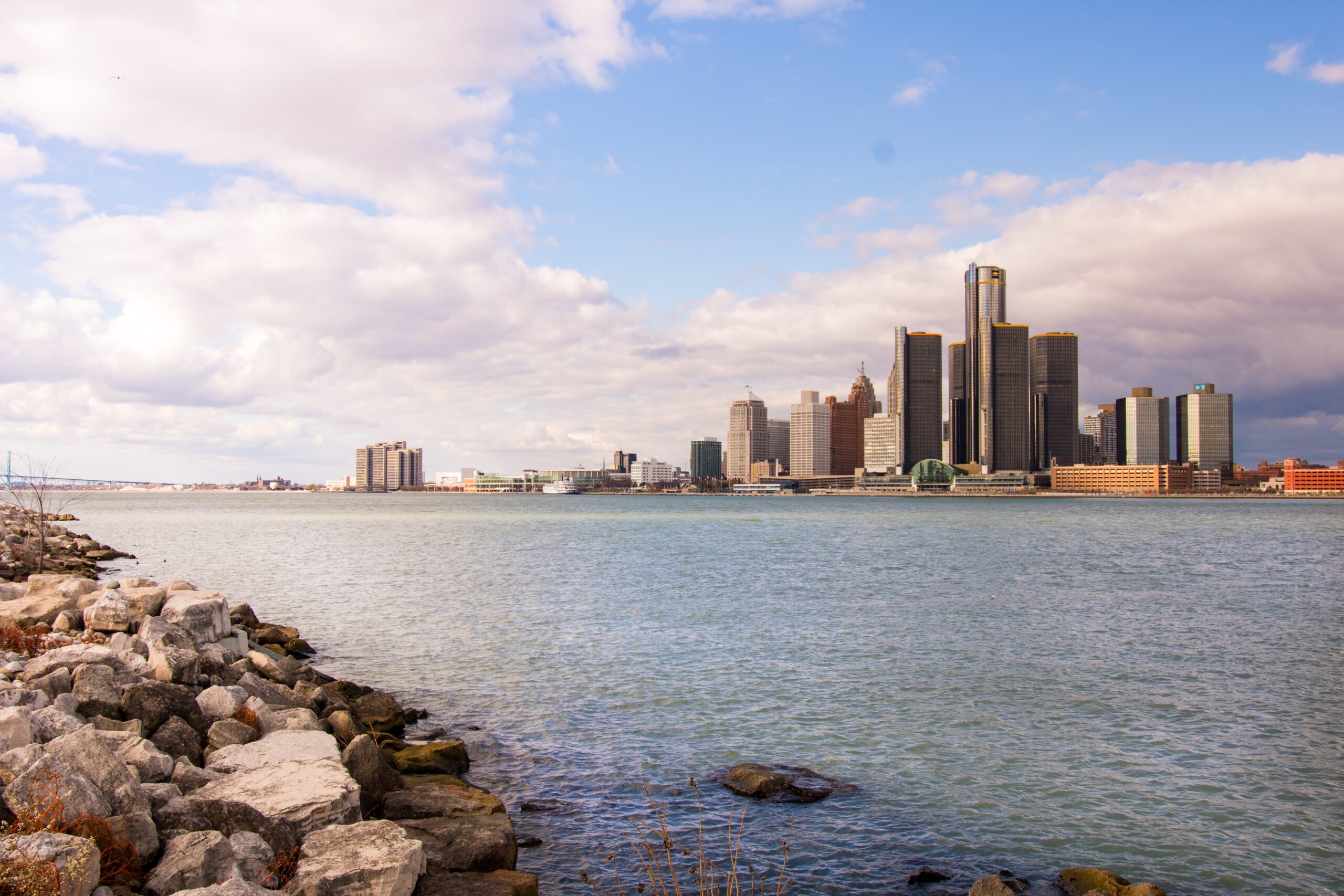 looking across a lake at tall buildings in Detroit, Michigan