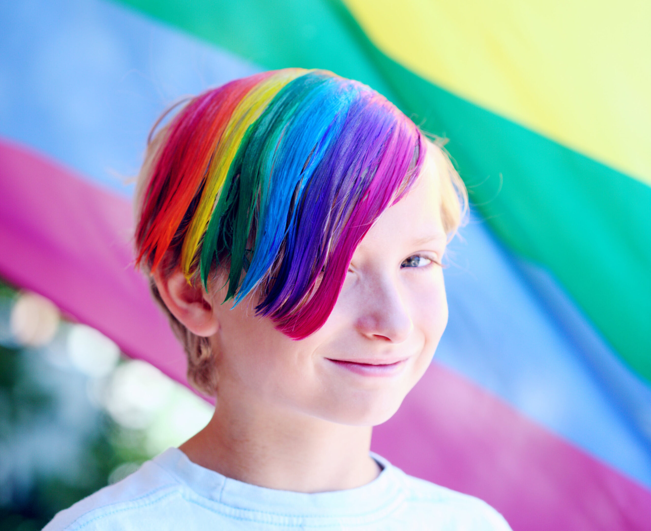 Kid with rainbow colored hair